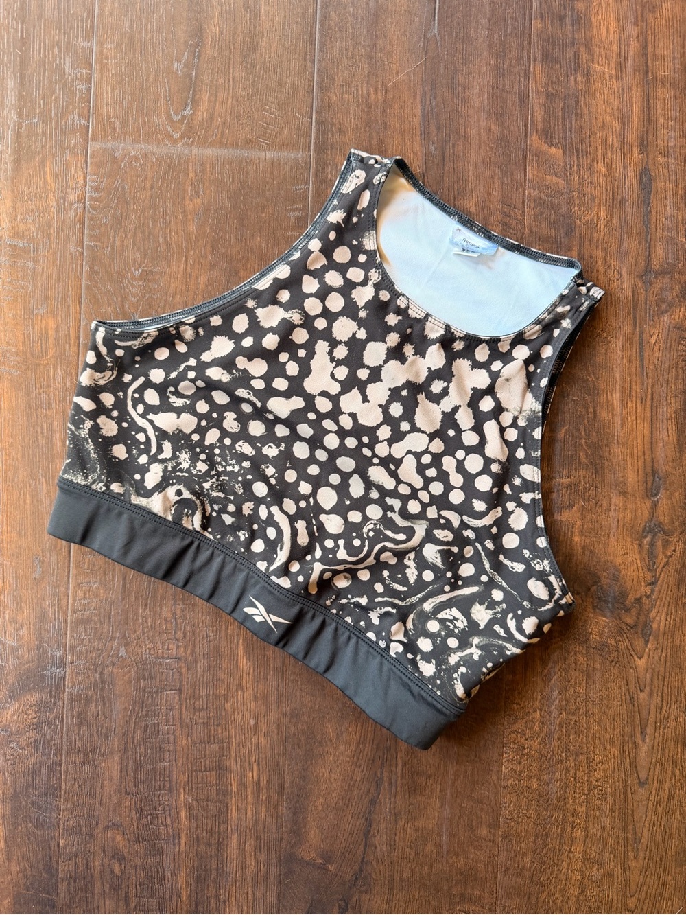 Reebok Cropped High-Neck Sports Bra in Black and Beige Print